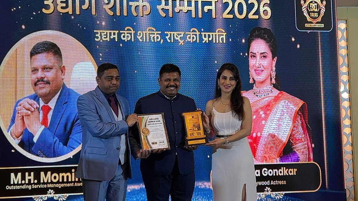 Maharashtra Udyog Samman — award ceremony with framed certificate and trophy